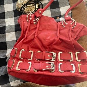 Large purse. Burnt red and silver. Gently used